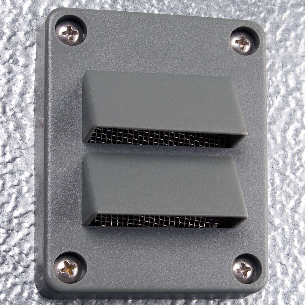 Kolpak P7-0612-CT Polar Pak 6' x 12' x 7' Indoor Walk-In Cooler with Top Mounted Refrigeration — supplier gallery view 7; A grey rectangular Kolpak wall plate with two metal corners and two holes.