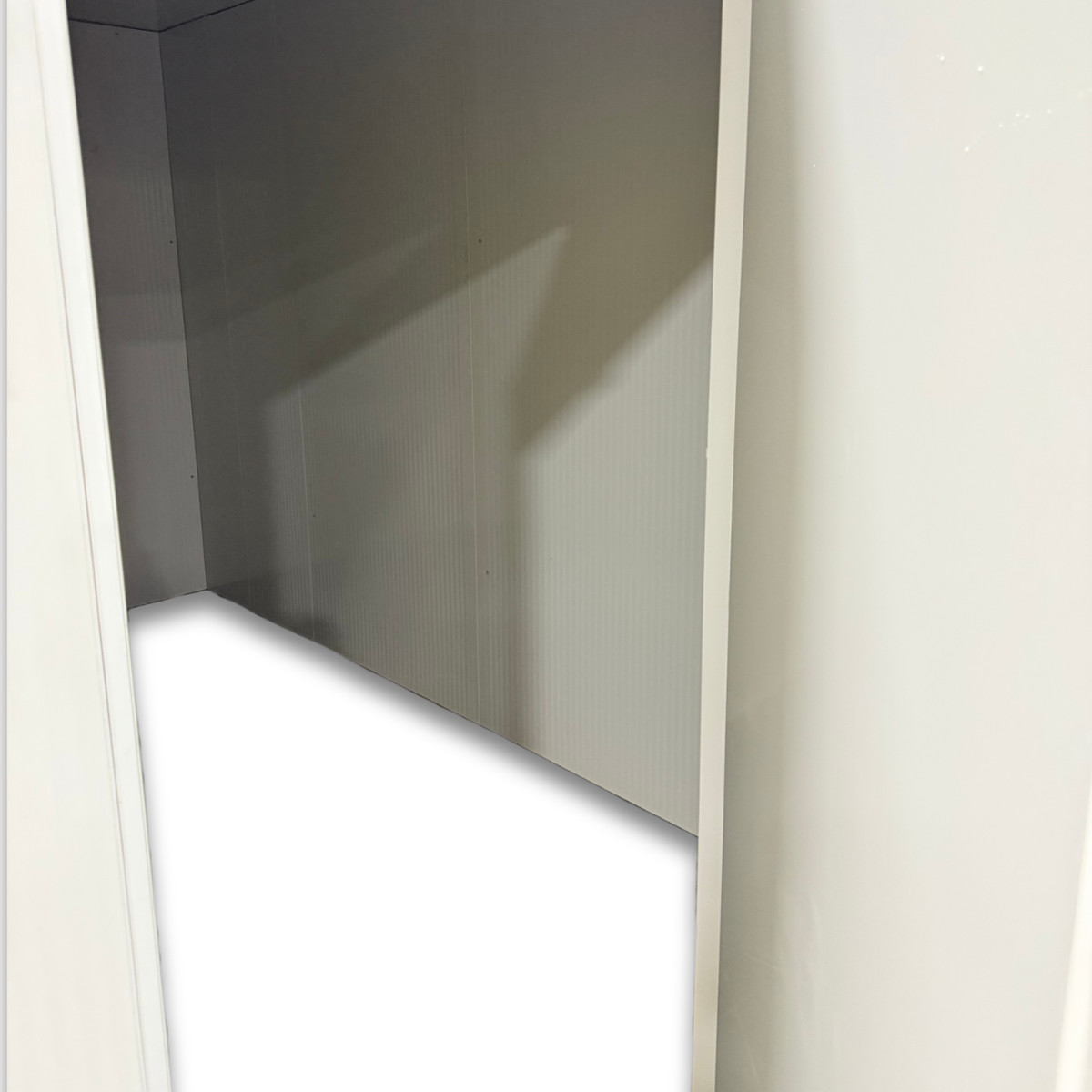 Barr 8'3" x 11'6" x 8'H Walk-In Cold Room without Floor — supplier gallery view 5; White walk-in cooler unit with closed hinged door, featuring insulated panel inside view