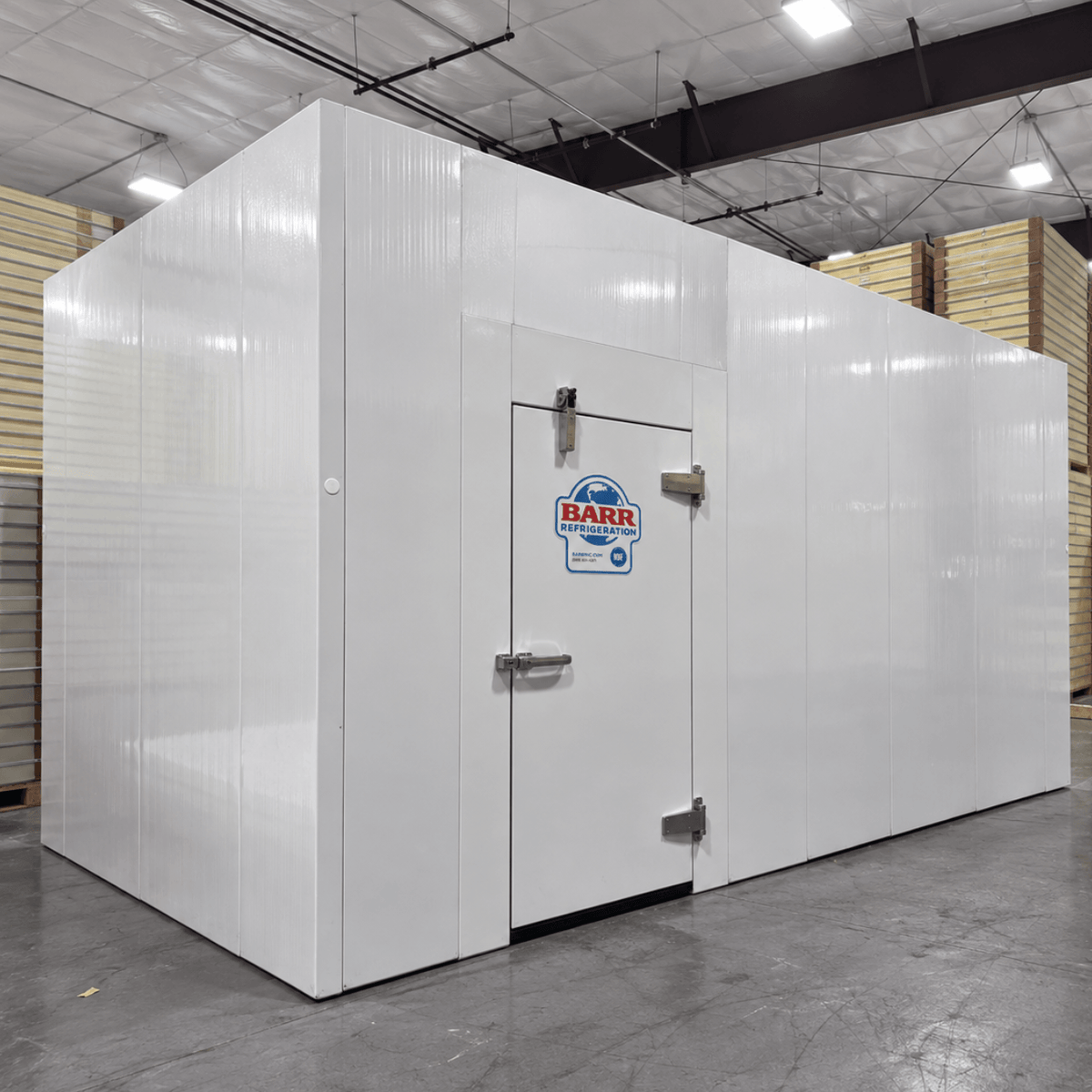 Barr 11'6" x 13'1" x 10'H Walk-In Cold Room without Floor — supplier gallery view 1; White walk-in cooler unit with closed hinged door, featuring insulated panel walls and a stack of ceiling panels