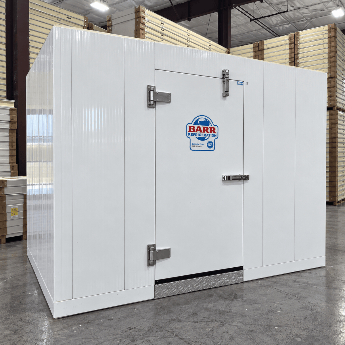 Barr 6'7" x 9'10" x 8'2"H Walk-In Freezer Room with Floor — supplier gallery view 1; White walk-in commercial freezer with an open door revealing a textured floor front left view