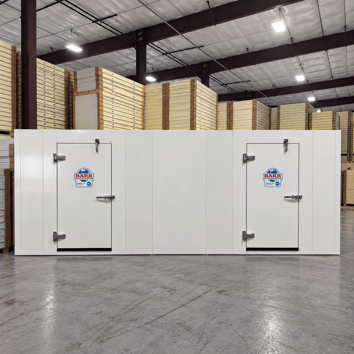 Barr 9'10" x 19'8" x 8'2"H Walk-In Cooler-Freezer Combo with Floor — supplier gallery view 1; Front view of a white walk-in combo cooler-freezer with two doors and stainless hardware