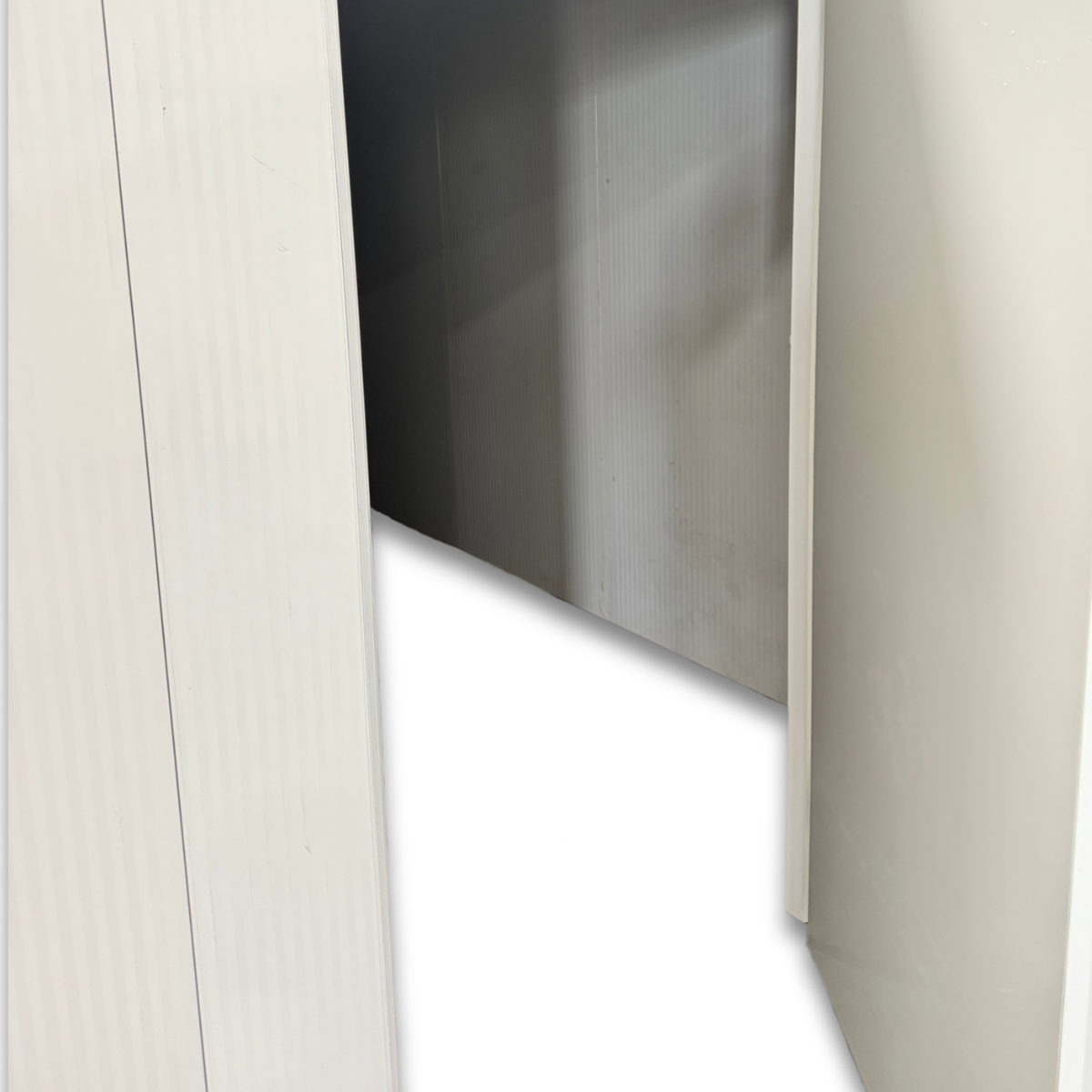 Barr 9'10" x 29'4" x 8'H Walk-In Cold Room without Floor — supplier gallery view 3; White walk-in cooler unit with closed hinged door, featuring insulated panel walls inside view