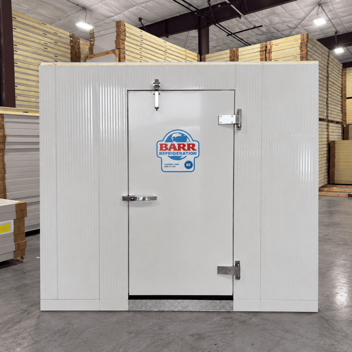 Barr 6'7" x 8'3" x 8'2"H Walk-In Freezer Room with Floor — supplier gallery view 1; White walk-in commercial freezer with a closed door