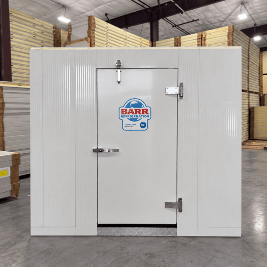 Barr 6'7" x 8'3" x 8'2"H Walk-In Freezer Room with Floor — supplier gallery view 1; White walk-in commercial freezer with a closed door