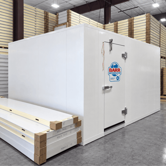 Barr 9'10" x 14'10" x 8'2"H Walk-In Freezer Room with Floor — supplier gallery view 1; White walk-in commercial freezer with ceiling panels next to it