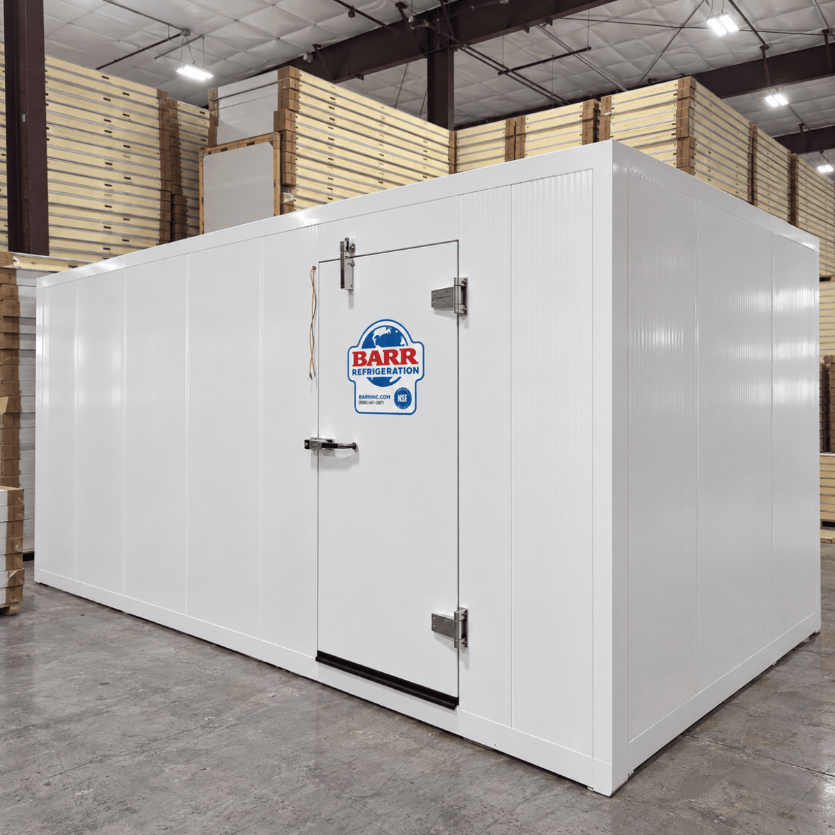Barr 9'10" x 18'1" x 8'2"H Walk-In Freezer Room with Floor — supplier gallery view 1; White walk-in commercial freezer with ceiling panels next to it