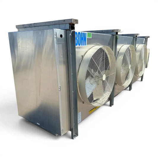 Used Bohn BHE-1200DA Evaporator #3190 — supplier gallery view 1; Front-left view of a used Bohn BHE-1200DA evaporator, a large three-fan cream-colored fan coil unit with wood shipping blocks and a Beacon II defrost control.