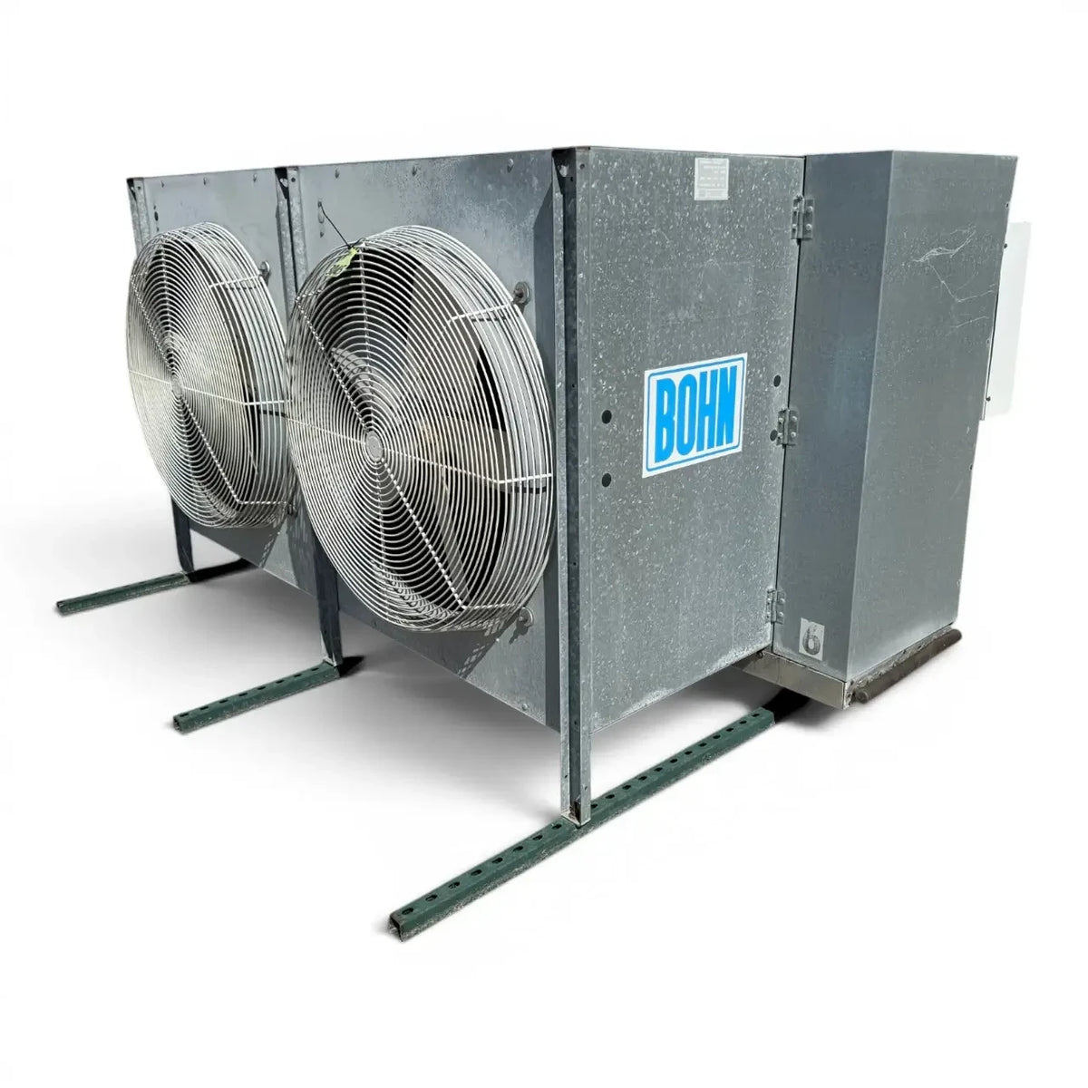 Used Bohn PG-2502D Evaporator — supplier gallery view 3; Front-right view of the used Bohn PG-2502D evaporator #3045, showing the cabinet access door and Bohn logo.