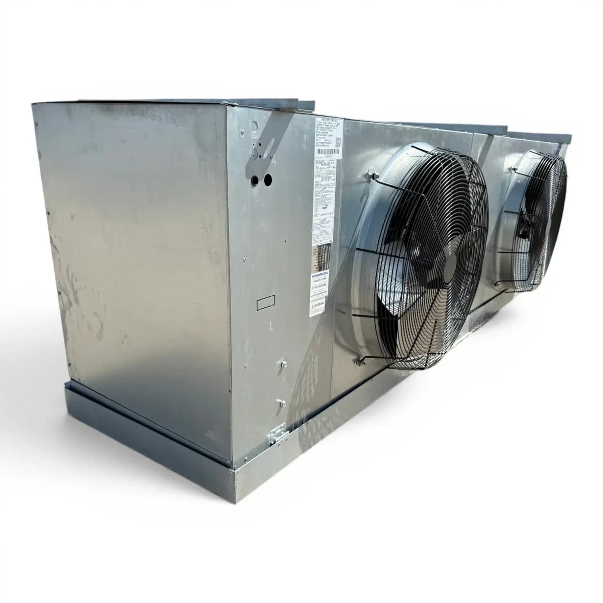 Used Krack SMA25E-1097SCMM Evaporator #3179 — supplier gallery view 3; Front-left view of the used Krack SMA25E-1097SCMM evaporator #3179, showing the two round black-grille fans and a Krack logo.