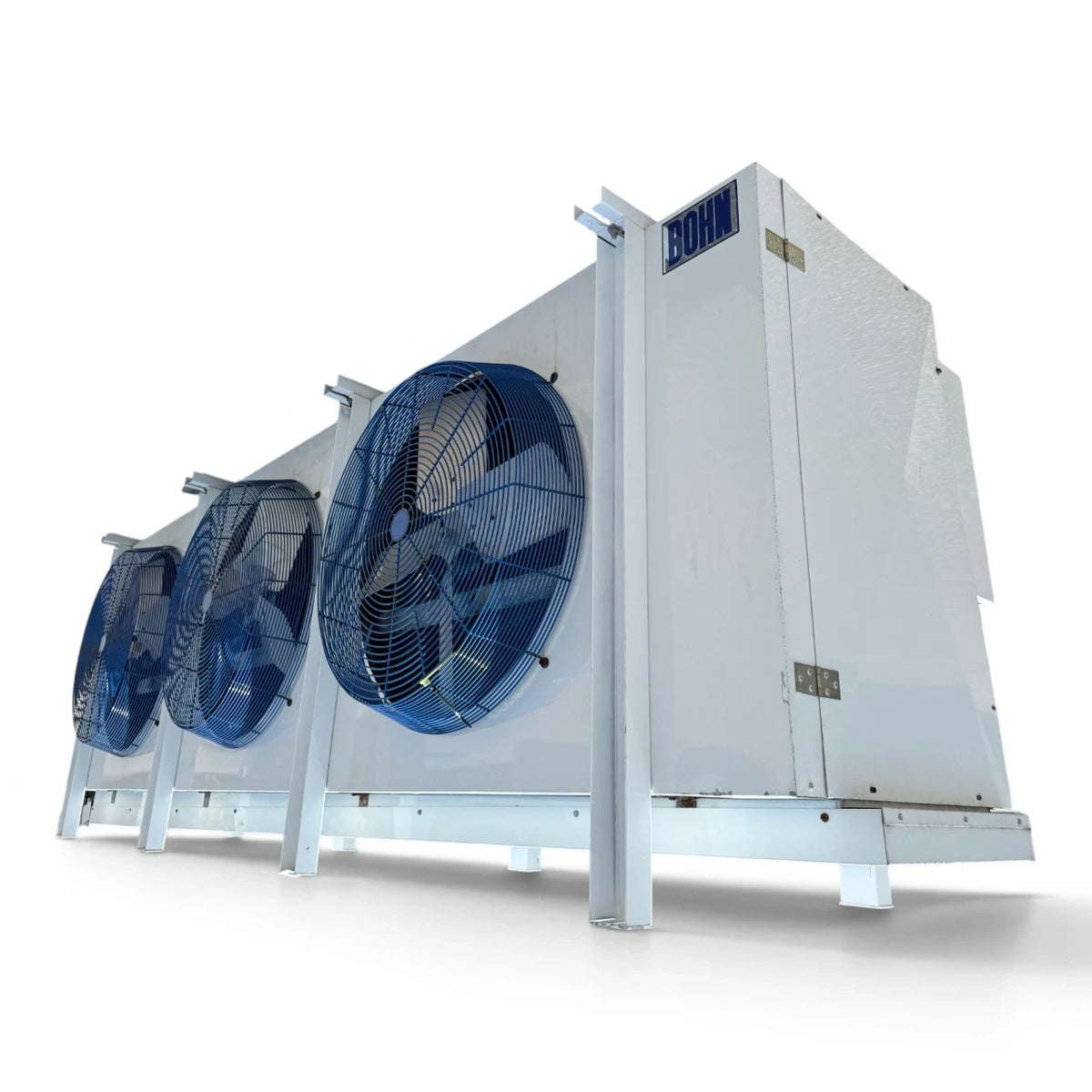 Used Larkin HLT4-746-4 Evaporator #3427 — supplier gallery view 3; Front-right view of the used Bohn evaporator, showing the cabinet side panel and mounting legs.