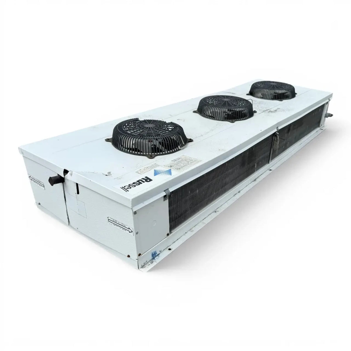 Used Russell FL36-135E Low Velocity Evaporator #669 — supplier gallery view 3; Front-left view of a used Russell FL36-135E low velocity evaporator #669, a white fan coil unit with three round black-grille fans.