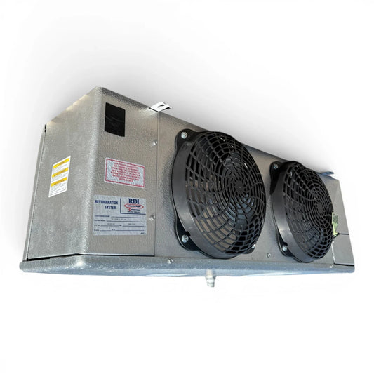 Used RDI LSF-090BK Evaporator #3049 — supplier gallery view 1; Front-left view of a used RDI LSF-090BK evaporator #3049, a gray fan coil unit with two round black-grille fans and an RDI Refrigeration Systems label.