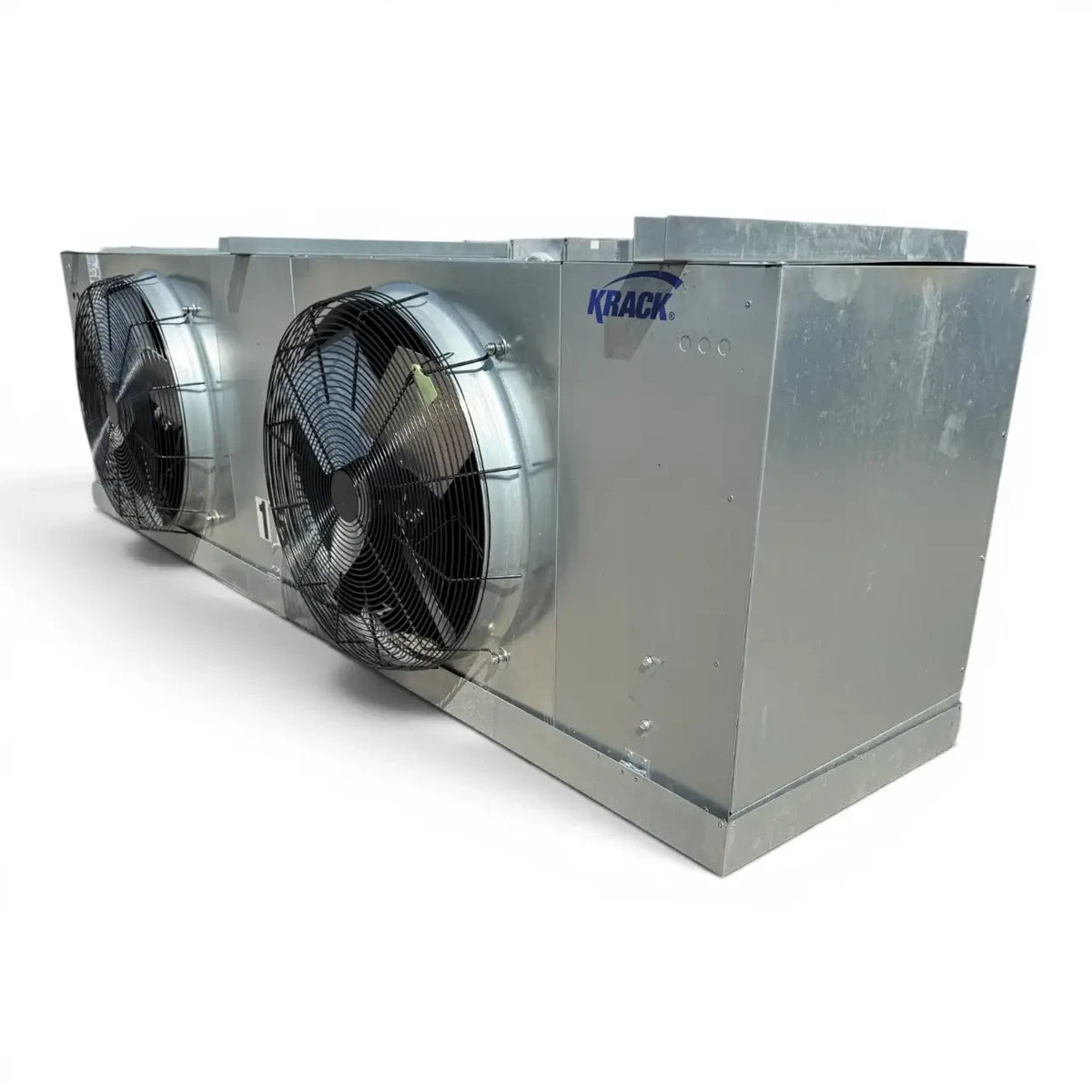 Used Krack SMA25E-1097SCMM Evaporator #3179 — supplier gallery view 1; Front-right view of a used Krack SMA25E-1097SCMM evaporator #3179, a gray fan coil unit with two round black-grille fans and a Hussmann rating label.
