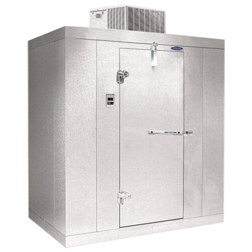 Norlake FTB8468-CX-M Fast Trak 6' x 8' x 8' 4" Floorless Indoor Walk-In Cooler — supplier gallery view 1; A white metal Norlake Kold Locker with a door open.