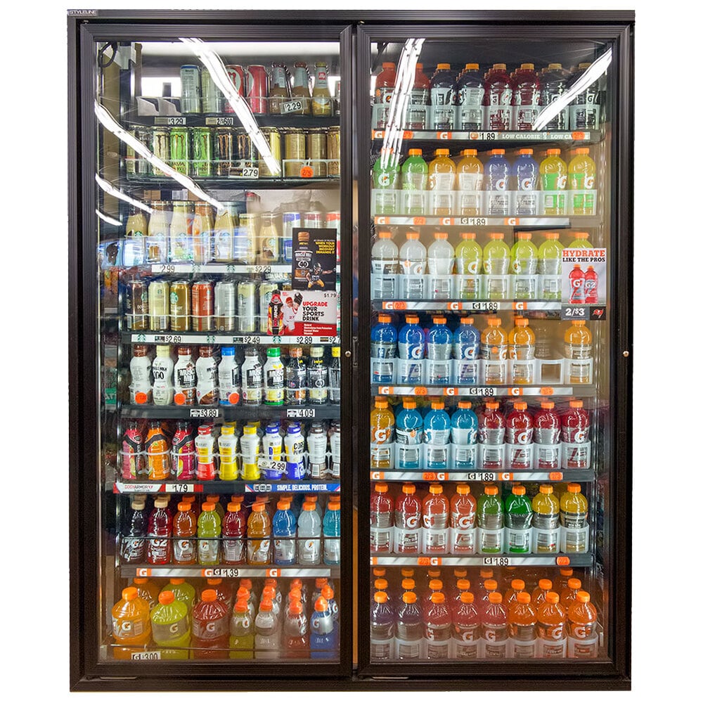 Styleline RM2475-NT Walk-In Merchandiser Doors with Shelving — supplier gallery view 1; A Styleline walk-in cooler merchandiser door with shelving filled with drinks.