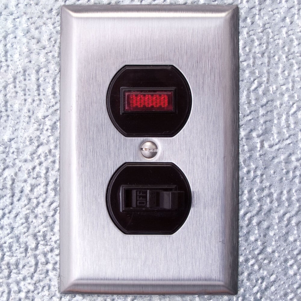 Kolpak P8-1212-CT Polar Pak 12' x 12' x 8' Indoor Walk-In Cooler with Top-Mounted Refrigeration — supplier gallery view 5; A close-up of the metal wall switch with red and black numbers on a Kolpak walk-in cooler.