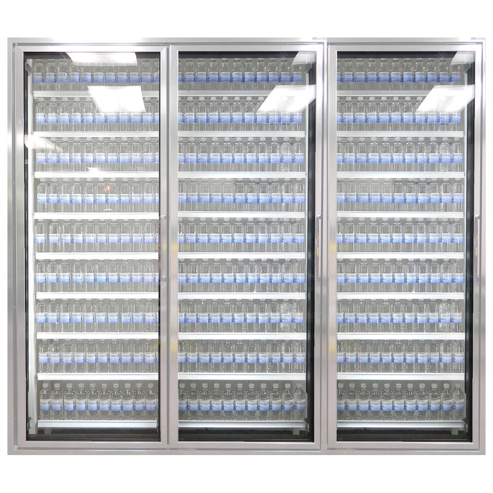 Styleline CL2472-LT Walk-In Merchandiser Doors with Shelving — supplier gallery view 12; A Styleline walk-in freezer merchandiser with many bottles of water on the shelves.