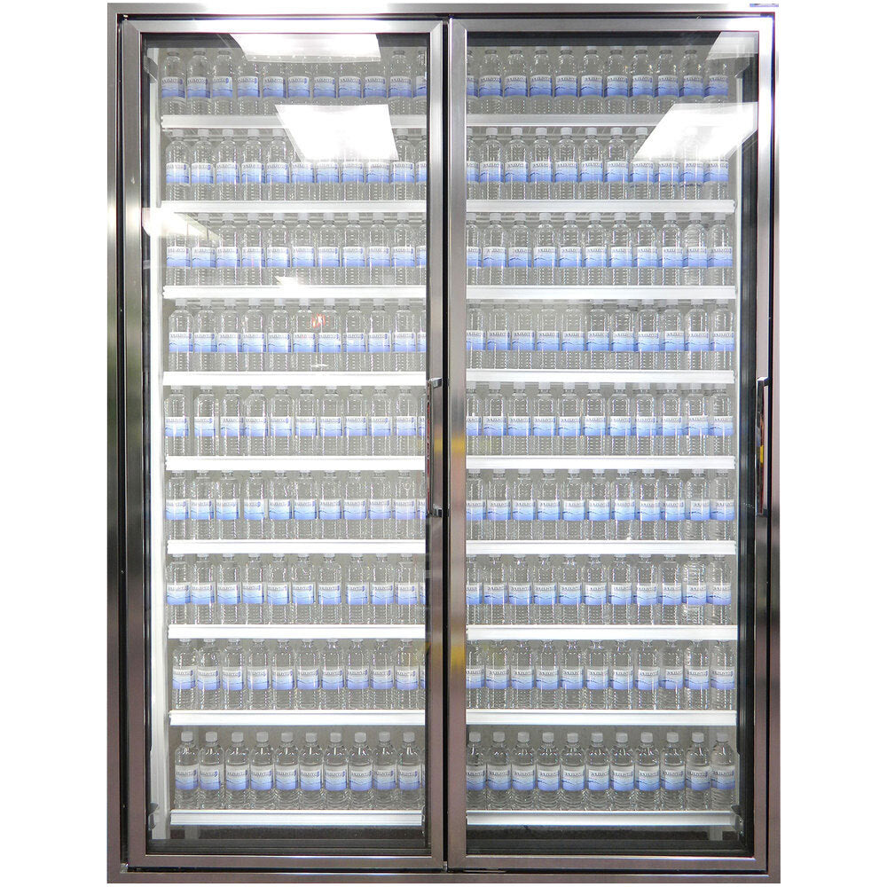 Styleline CL2472-LT Walk-In Merchandiser Doors with Shelving — supplier gallery view 7; A Styleline walk-in freezer merchandiser with glass doors holding bottles of water.